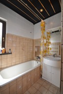 Verkauf Einfamilienhaus mit Doppelgarage und Partyraum Bad
