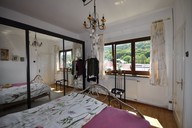 Verkauf Einfamilienhaus mit Doppelgarage und Partyraum Schlafzimmer