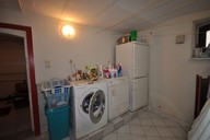 Verkauf Einfamilienhaus mit Doppelgarage und Partyraum Waschmaschinenraum