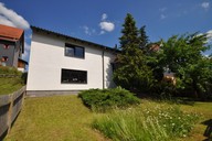 Verkauf Einfamilienhaus mit Doppelgarage und Partyraum Rückansicht