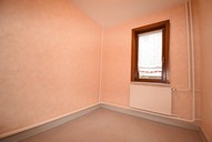 Verkauf Freistehendes Ein- bis Zweifamilienhaus mit viel Nebengelass Ansicht Kinderzimmer