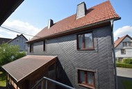 Verkauf freistehendes Einfamilienhaus mit Nebengelass Rückseite