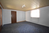 Verkauf freistehendes Einfamilienhaus mit 3 Garagen in Beinerstadt Wohnzimmer